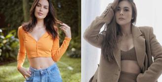 Padu padan crop top berwarna oranye cerah dan high waist jeans bikin Sophia Latjuba terlihat awet muda di usia 52 tahun. @sophia_latjuba88.